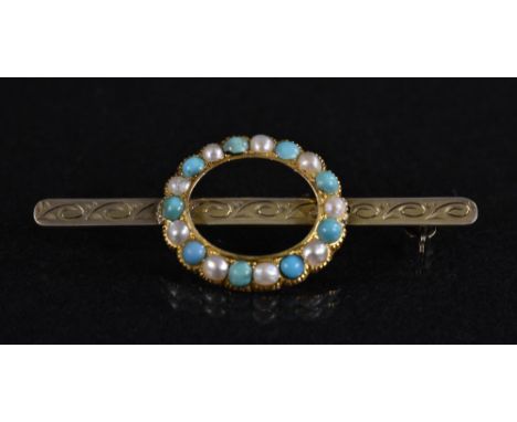 A turquoise and half pearl yellow metal brooch, oval alternating ring of nine turquoise cabochons and nine half pearls, yello
