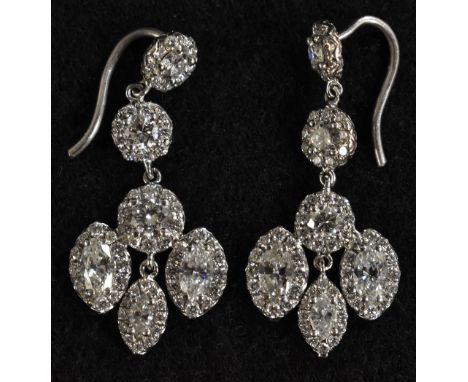 A pair of Art Deco diamond drop earrings, each set with sixty six round and navette cut diamonds, total estimated diamond wei