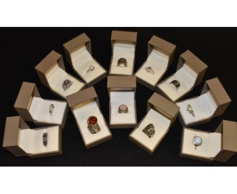 Rings -  a cubic zirconia multi tone floral cluster ring;  an Israeli band agate looping ring, stamped Israel PZ 925; a rose 
