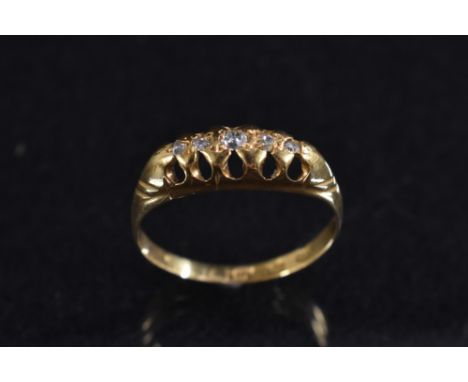 A diamond quintet ring, graduated linear crest of five old rose cut diamonds, 18ct gold shank, size M ,2.2g gross, boxed