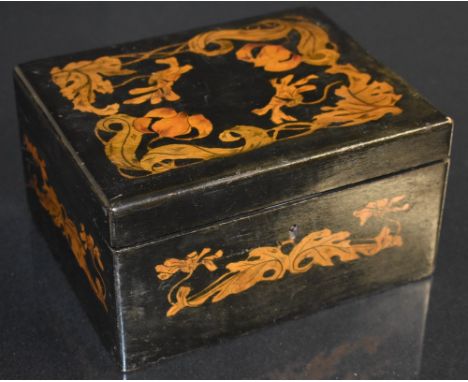 An Art Nouveau pen work sewing box, decorated with flowers, and sinuous whiplash stems and leaves, hinged cover, 21cm wide, c