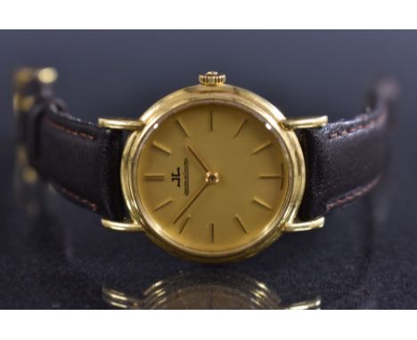 Jaeger le Coultre  - a lady's 18ct gold wristwatch, brushe gilt dial , block batons, manual wind movement, serial No 2211871,