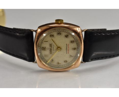 Ebolux   - a vintage 1940s 9ct gold cased wristwatch, textured dial, raised Roman numerals, minute track, gilt hands, manual 