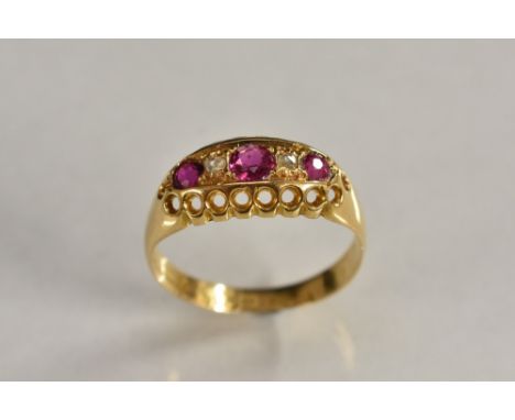 A ruby and diamond quintet ring, set with three round cut pinky red rubies, each divided by a rose cut diamond accent, 18ct g