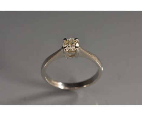 A diamond solitaire ring, round modern brilliant cut diamond approx 0.50ct, quarter claw set, 18ct white gold shank, stamped 