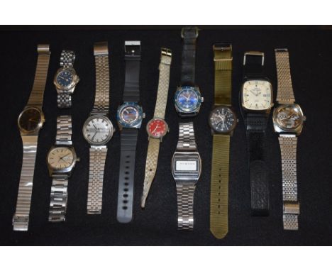 Watches - a 1970s Timex GT mechanical wristwatch,  brushed grey dial, red/white baton markers, Arabic 6 and 12, date aperture