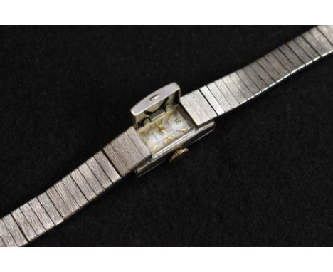 Wakmann  - a vintage 1960sc rolled white gold plated bracelet watch, textured bark effect body invisible with folding cover r