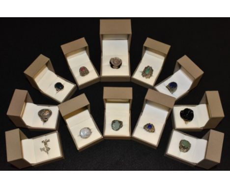 Rings -  a carved two tone grey and black floral ring;  another black;  a lapis lazuli panel ring;  others quartz, turquoise,
