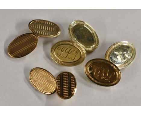 Gentleman's Jewellery - a pair of 9ct gold oval panel cufflinks, central plain or monogrammed panel ornate border, Birmingham