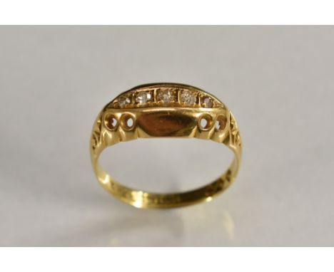 A diamond quintet ring, linear set with five graduated old cut diamonds, 18ct gold shank, size N, 2.6g gross, boxed