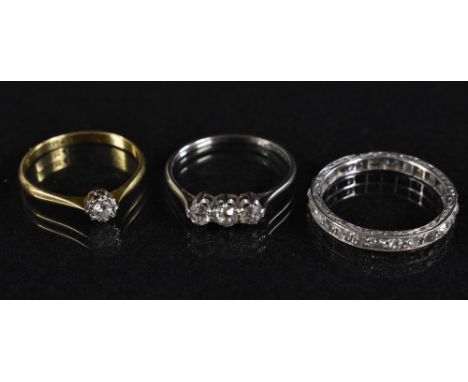 Rings- a diamond trilogy ring, each approx 0.07ct, total estimated diamond weight approx 0.21ct, platinum claw, 18ct white go