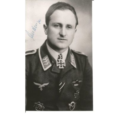 WW2 Luftwaffe ace Eduard Lindinger KC signed 6x3 black and white portrait photo. Good Condition. All autographs are genuine h