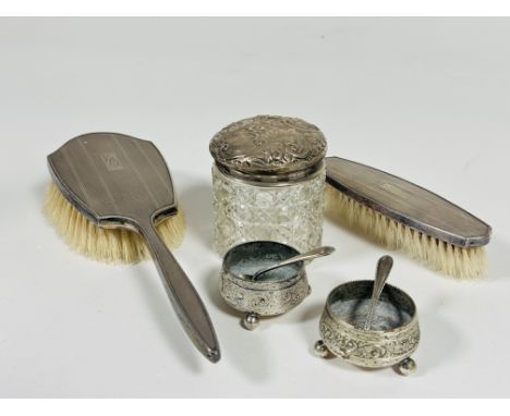 A Birmingham silver two piece part dressing table brush set with engine turned decoration, a pair of Epns cauldron salts and 