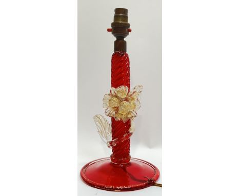 An Italian/Murano blown glass lamp base, the foot and stem in red with twisted shape, and clear/gold-included glass flower de