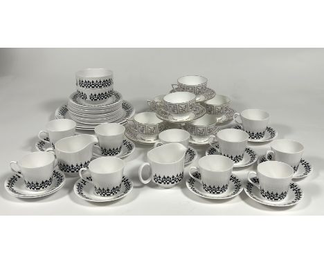 A Ridgway China Minaret pattern part tea service ten tea cups, a milk jug, a creamer, two bowls (h-6cm), eleven saucers (w-13