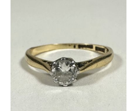 A 18ct gold and platinum solitaire Diamond round brilliant ring set in claw mount, approximately 0.25ct, K. 1.87g