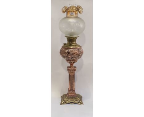 An Impressive American brass and rose gilt cast metal oil lamp, late 19th century, stamped The Miller Lamp, Made in the USA, 