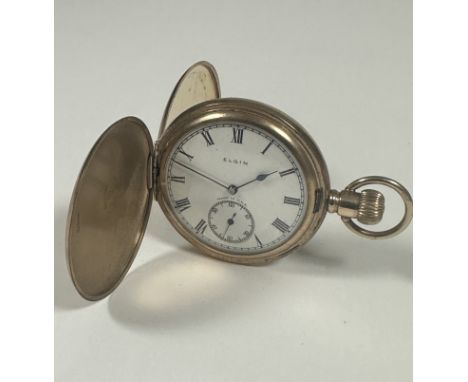 A Elgin USA Hunter gold plated presentation pocket watch with enamel dial and Roman numerals and subsidiaries dial complicati