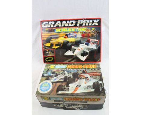 Two boxed Scalextric sets to include C559 Grand Prix 8 with both slot cars and C653 Grand Prix with both slot cars