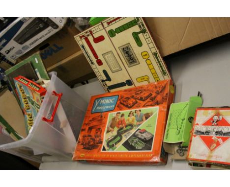 Mixed group of toys and games to include boxed Triang Minic Motorways with two slot cars, Monopoly, boxed Merit Magic Robot e