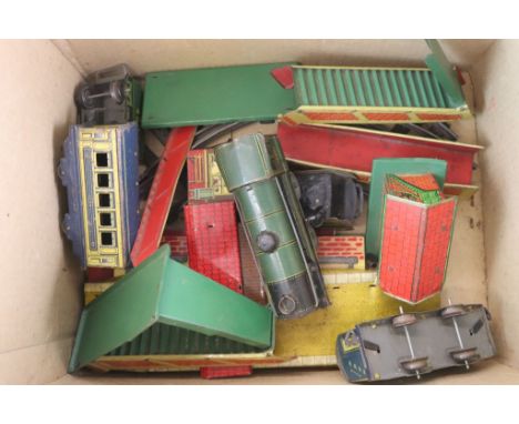 Quantity of Brimtoy tin plate clockwork tin plate model railway to include loco, rolling stock, track and trackside accessori