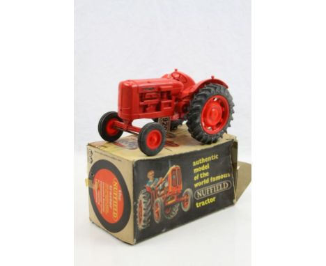 Boxed Pippin Toys The Nuffield Tractor plastic model, model gd with box missing part of end flap