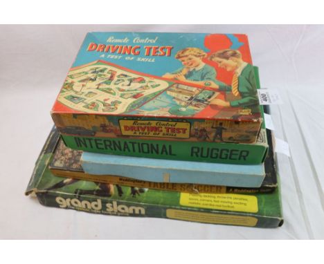 Five boxed vintage games to include A Merit Toy Remote Control Driving Test, Electrical Outfit, Godfrey Evans Games Internati