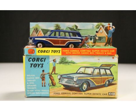 Boxed Corgi 440 Ford Consul Cortina Super Estate Car in blue, a few paint chips but vg overall, both figures and glf bag, inn
