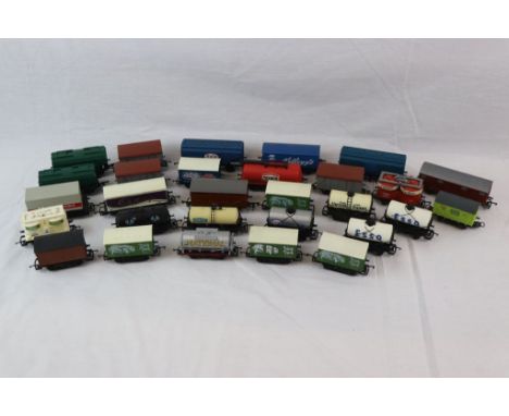 30 OO gauge items of rolling stock, all trucks and wagons to include Triang, Hornby, Mainline and Lima