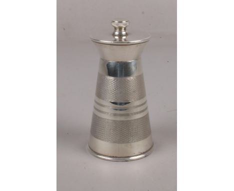 An Elizabeth II, silver pepper mill, maker Joseph Gloster Ltd, assayed Birmingham 1964, with striped machined decoration, 10c