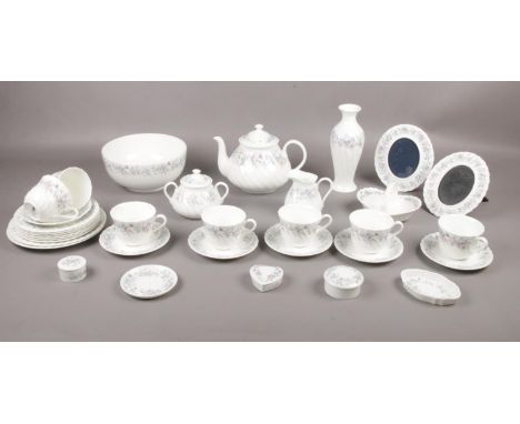 A large collection of Wedgwood 'Angela', tea set with teapot, cups/saucers, tea plates, milk jug to include vase, trinkets, p