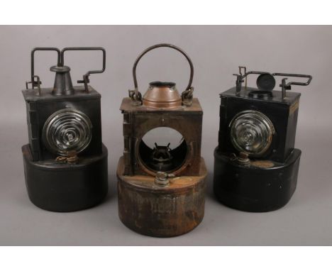 Three vintage LMS railway petroleum signal lamps.  One rusted and missing glass. Only one lamp with chimney.