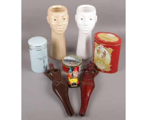 A group of a collectables to include ceramic face vases, wooden novelty nut crackers, Corgi Noddy's diecast car, advertising 