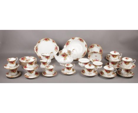 A collection of Royal Albert 'Old Country Roses', Teapot, tea cups/ saucers, tea plates, milk jug, cream jug, coffee cups/sau