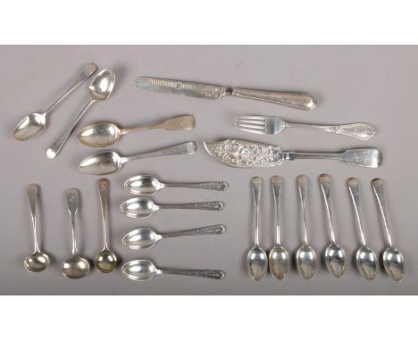 A collection of silver cutlery to include Georgian and Victorian examples. (313g).  