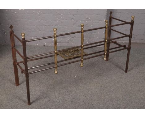 An early 19th century steel and brass fire fender with sliding pierced brass trivet, measuring - 202cm width, 36.3cm depth &a