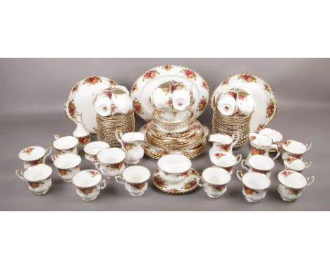 A box of Royal Albert old country roses design to include dinnerplates, cup &amp; saucers, sugar bowl, cream jug, etc.  Mostl