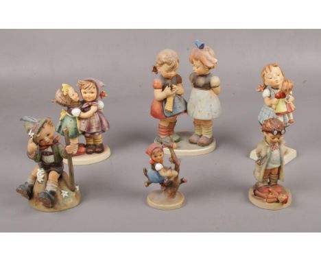 Six Goebel ceramic figure's, Telling her Secret Hum 196, Knitting Lesson Hum 256, Kiss Me Hum 311 examples  Good condition.