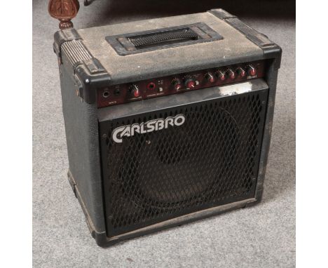 A Carlsbro amplifier and speaker (46cm width x 47cm height).  