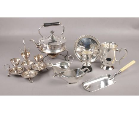 A collection of silver plate, to include spirit kettle, Campbell &amp; Lumby egg cup set, sauceboats etc.  