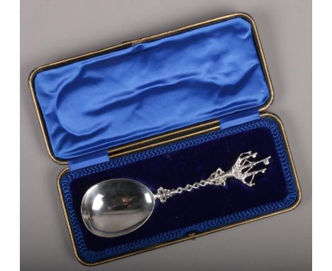 A cased silver spoon with galleon shaped terminal assayed Sheffield 1907 by Joseph Rodgers &amp; Sons, length 19cm. (61g).  