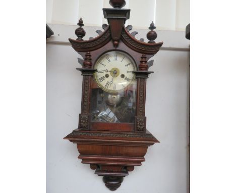 A small Ornate Wall Clock