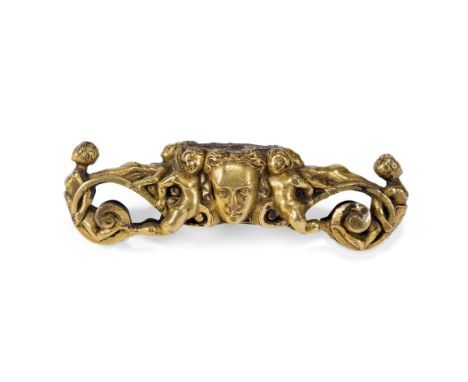 A FRANCO-ITALIAN GILT BRONZE QUILLON  16TH CENTURY  The dagger guard with central mask within scrolling figural ends, now mou