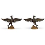 CIRCLE OF EUGENE VIOLLET-LE-DUC (1814-1879)- AN UNUSUAL PAIR OF GILT BRONZE GRIFFINS