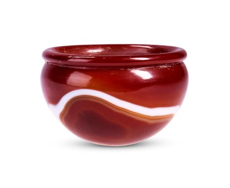 A NEAR EASTERN BANDED AGATE BOWL  3RD - 1ST CENTURY B.C. 4cm high, 5.4cm diameter    Condition Report:  Natural flaws, polish