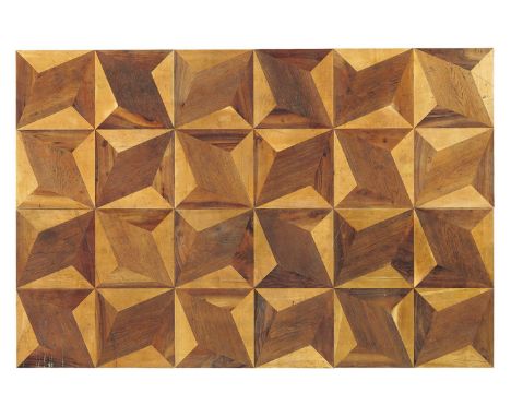 AN OAK, WALNUT, POPLAR AND SYCAMORE PARQUETRY FLOOR  FRENCH, 18TH/19TH CENTURY  The geometric design radiating from a central