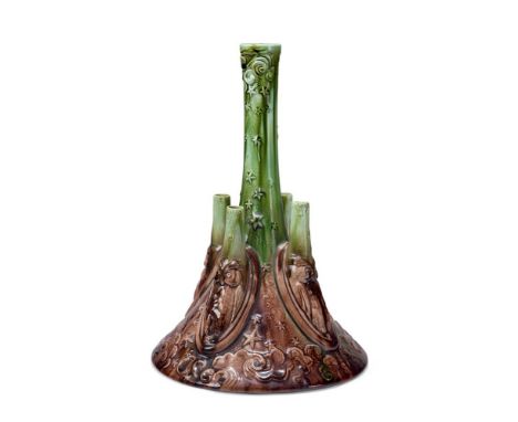 CHRISTOPHER DRESSER (1834-1904) FOR AULT POTTERY- AN OWL VASE  LATE 19TH/EARLY 20TH CENTURY  Glazed in brown and green with c