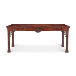 A GEORGE III STYLE MAHOGANY SERPENTINE SIDE TABLE, POSSIBLY IRISH