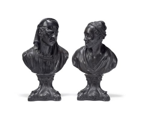 ATTRIBUTED TO JAMES NEALE & CO - A PAIR OF BLACK BASALT BUSTS OF HERACLITUS AND DEMOCRITUS  EARLY 19TH CENTURY  Depicting the