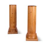 A PAIR OF FLUTED WOOD PEDESTALS, EARLY 19TH CENTURY